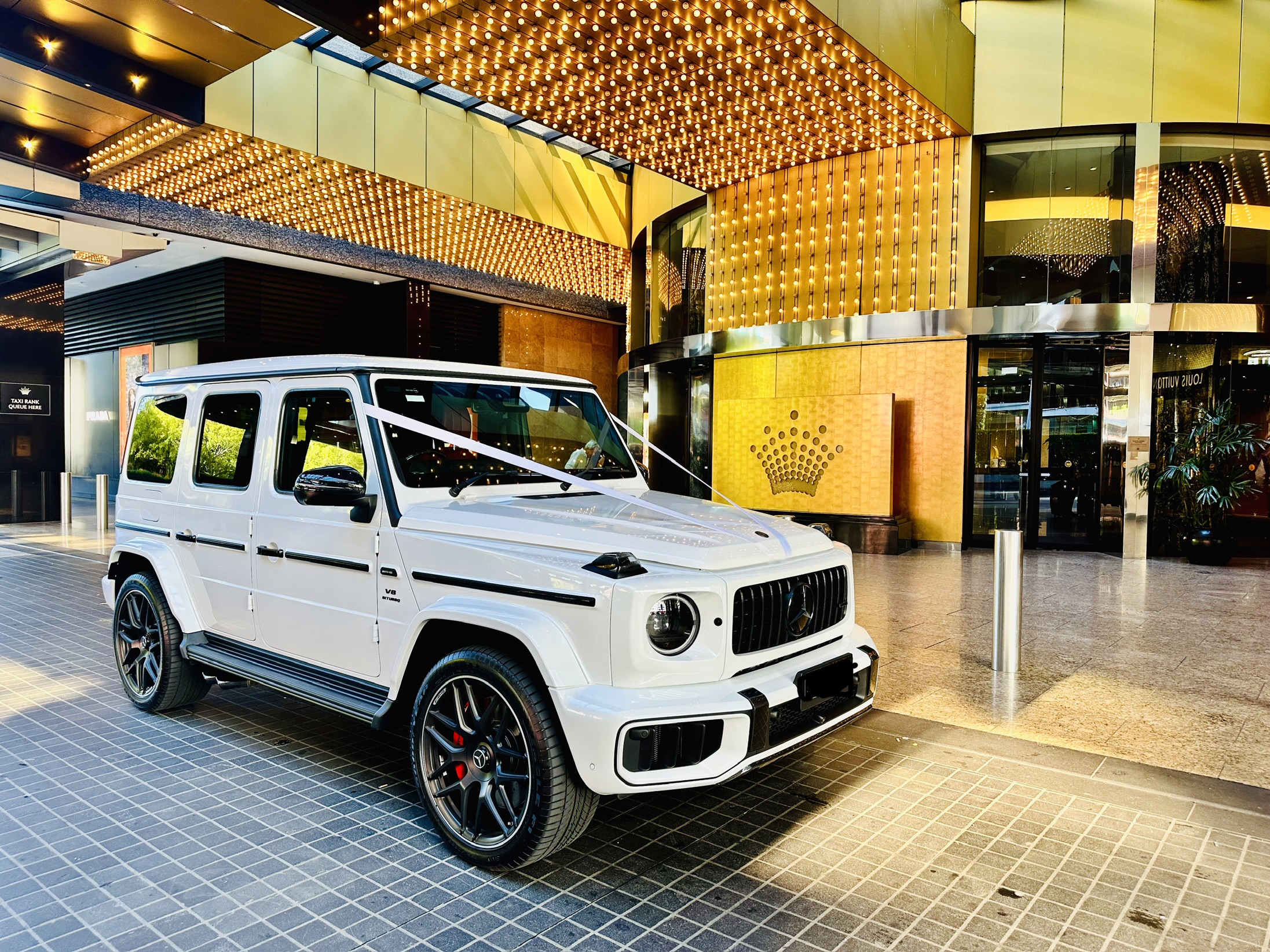 Wedding car styled with ribbon decoration